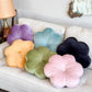 colorful flower pillows on a sofa